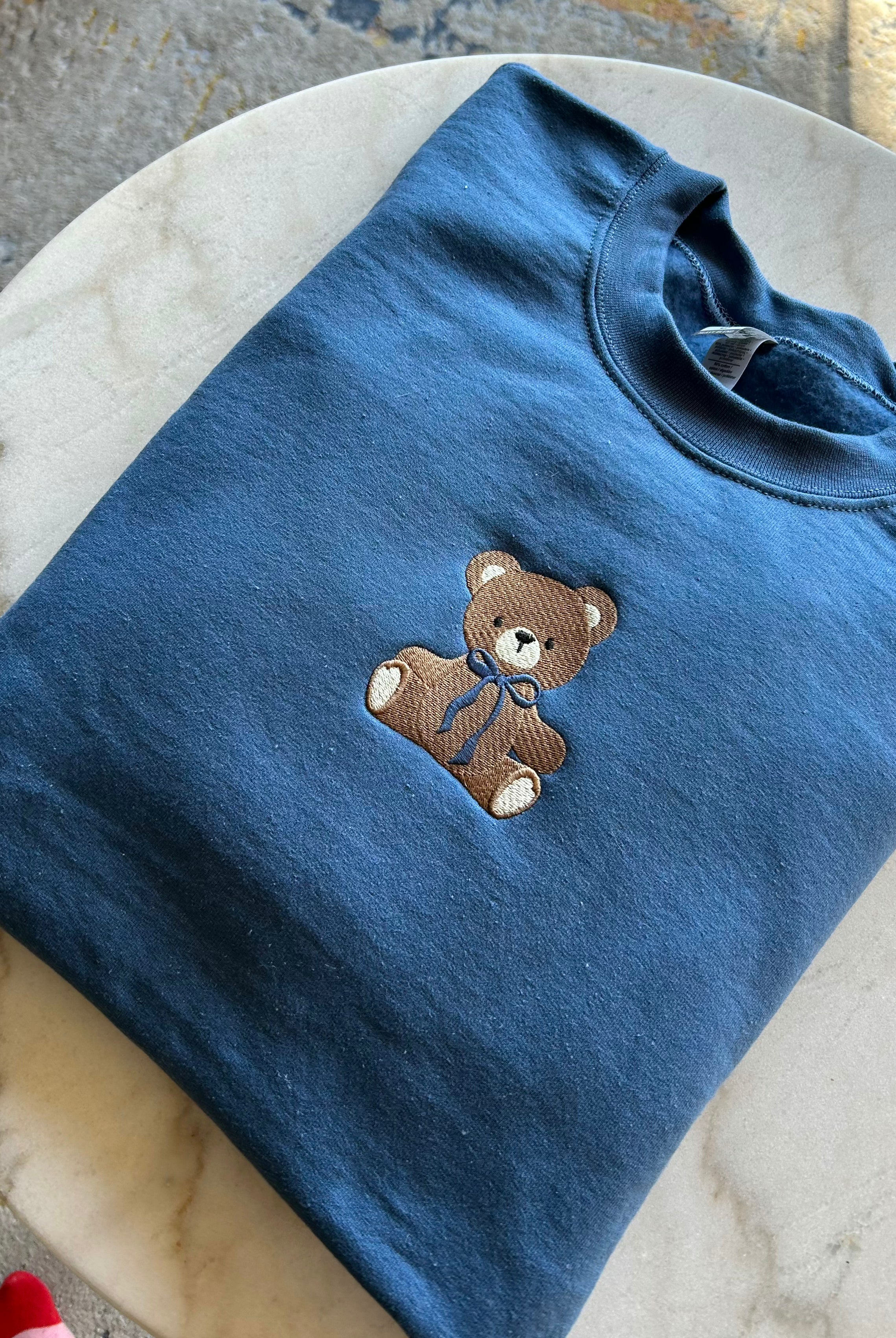 Blue Teddy Bear Embroidered Sweatshirt folded