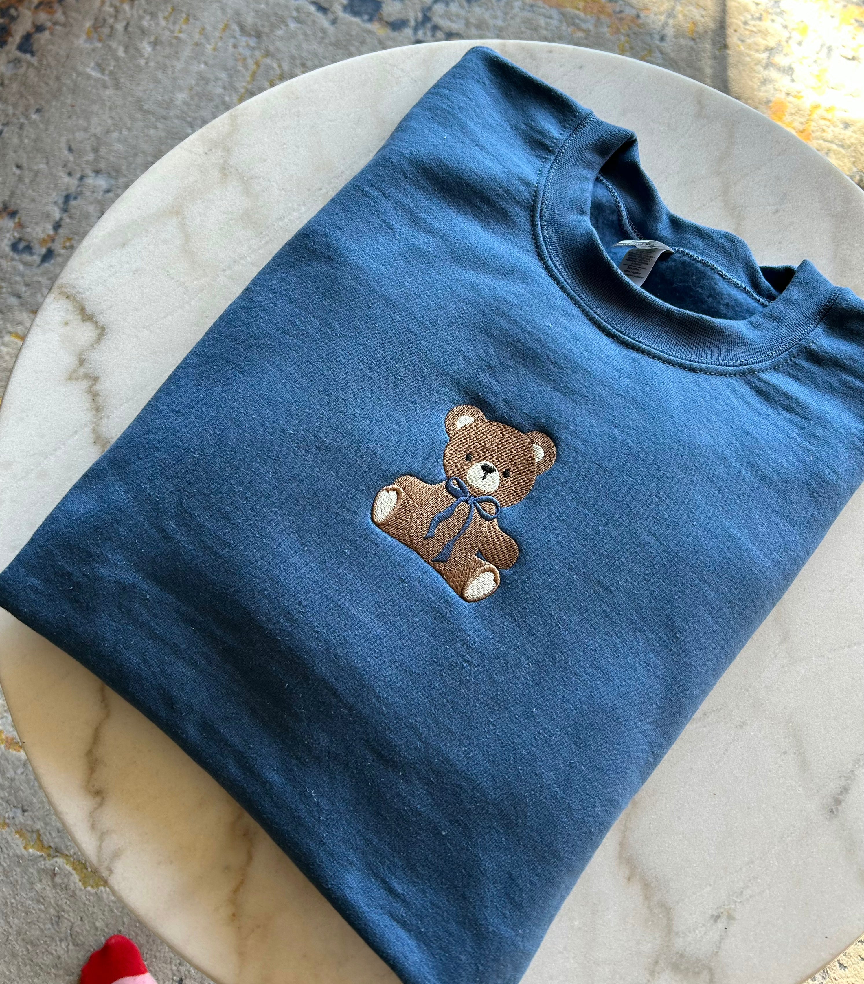 Blue Teddy Bear Embroidered Sweatshirt folded
