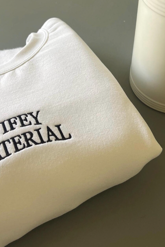 Wifey Material Embroidered Crewneck folded