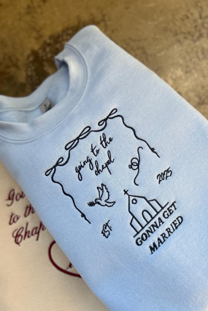 Going to the Chapel in Blue Embroidered Crewnecks folded