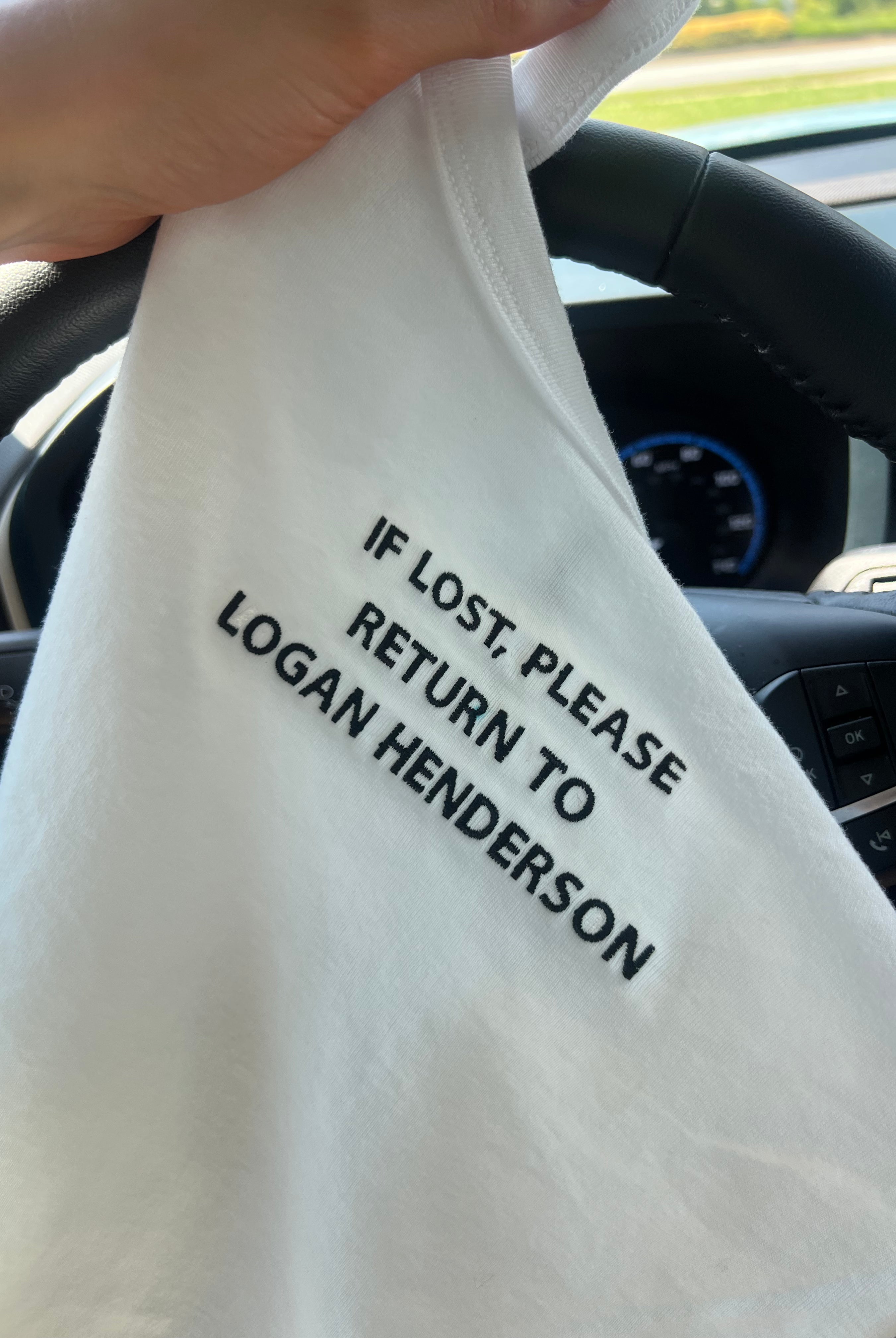 If Lost Please Return To Tank displayed in car