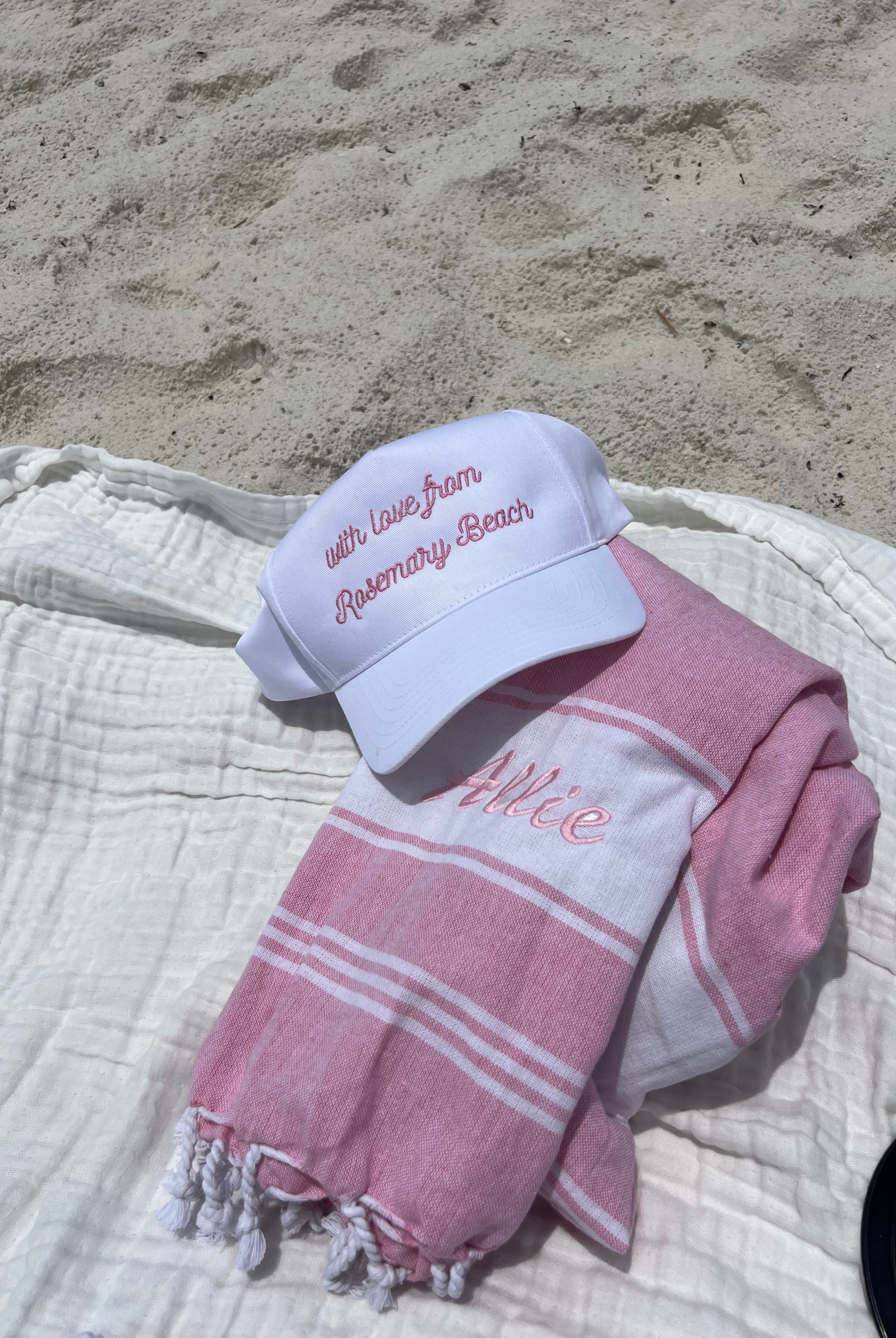 With Love From Hat on beach towel
