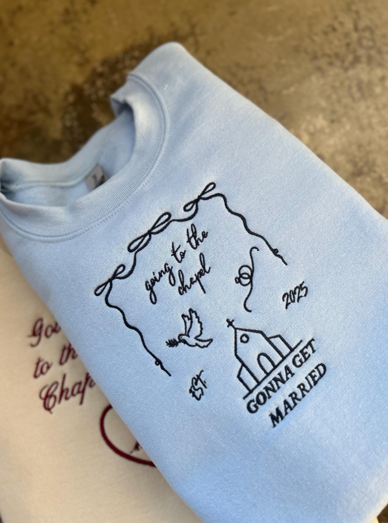 Going to the Chapel in Blue Embroidered Crewnecks folded