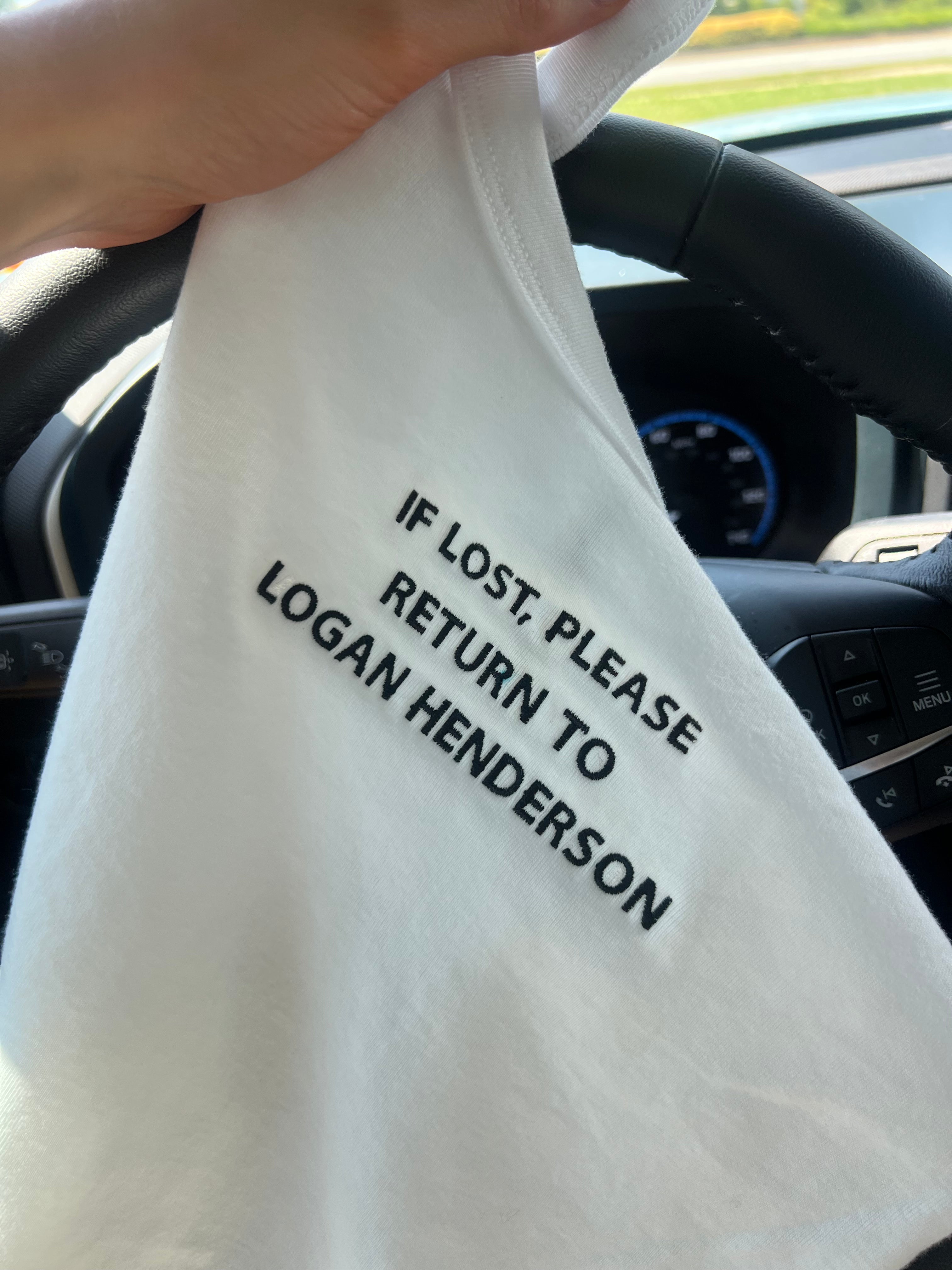 If Lost Please Return To Tank displayed in car