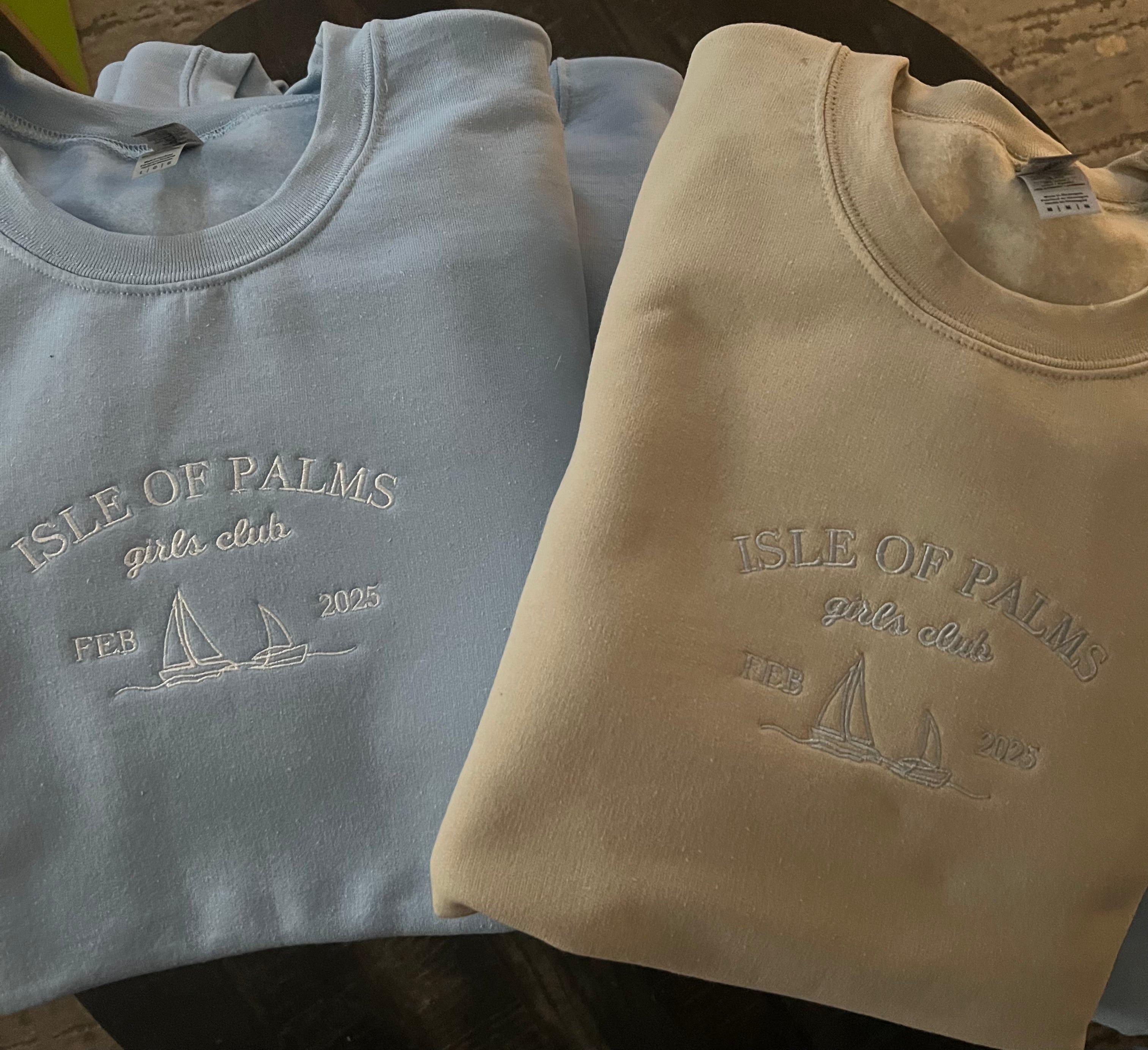 Sail Away: Custom Embroidered Sailboat Sweatshirts displayed